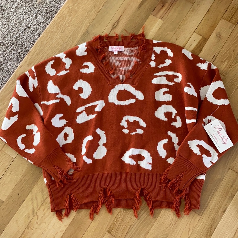 Tattered leopard print Vneck sweater
